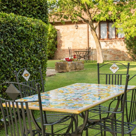 Tavolo in pietra lavica Grottesche